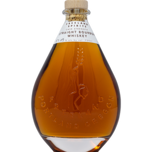 Bottle of Freeland Straight Bourbon Cask Strength Whiskey. Bottle features Freeland Logo and words Freeland Portland, Oregon.